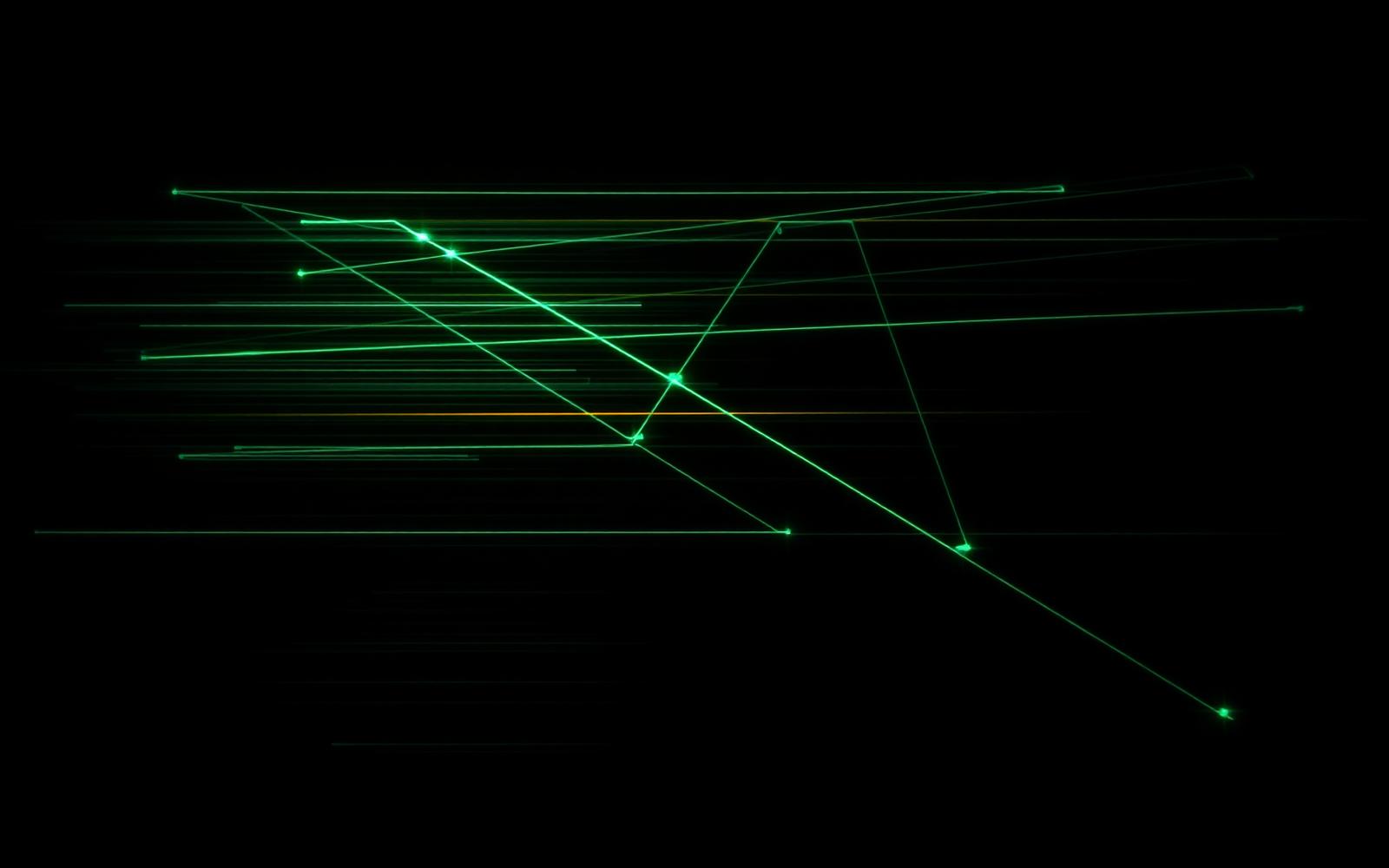 Abstract green light trails on black